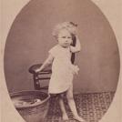Child with tin bathtub